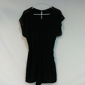 Black Sheer Romper shorts. Medium. Buttons in back